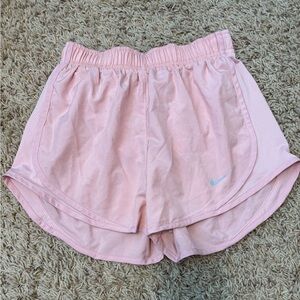 Pink Nike running shorts